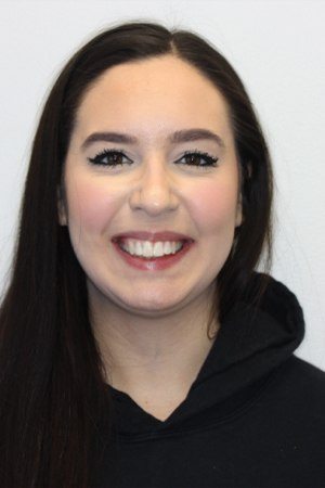 Teen girl with beautiful smile after orthodontics