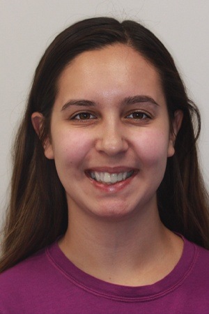Preteen girl with crooked top teeth before orthodontics