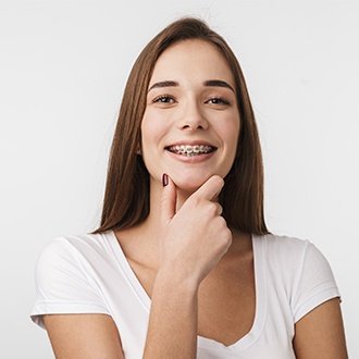 Woman with braces smiling