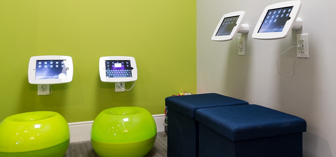 Tablet computers and fun seating in orthodontic office waiting room